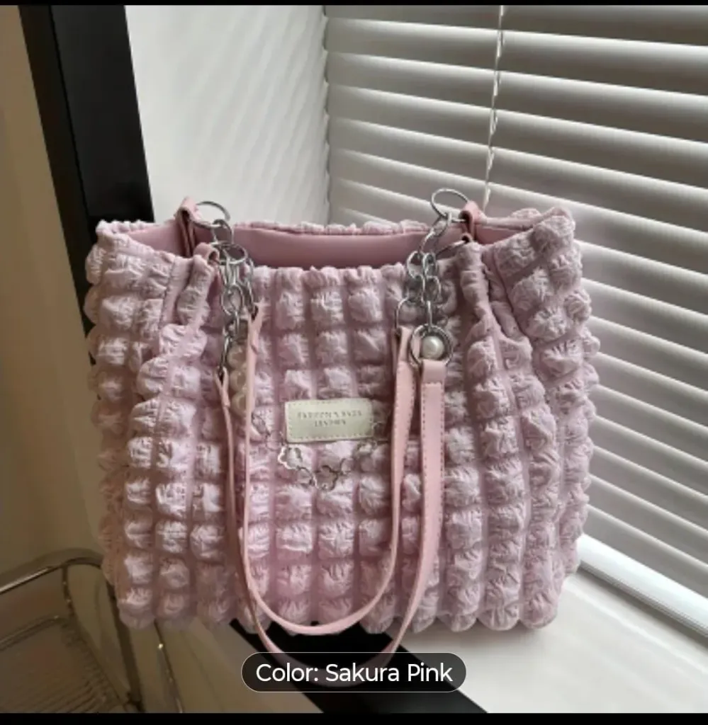 Sakura Pink Textured Handbag – Soft Quilted Tote with Chain Detail